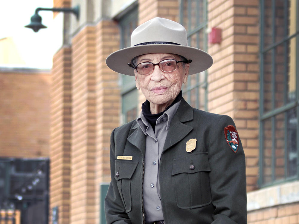 Soskin sits in front of the Rosie the Riveter/WWII Home Front National Historical Park Visitor Education Center.