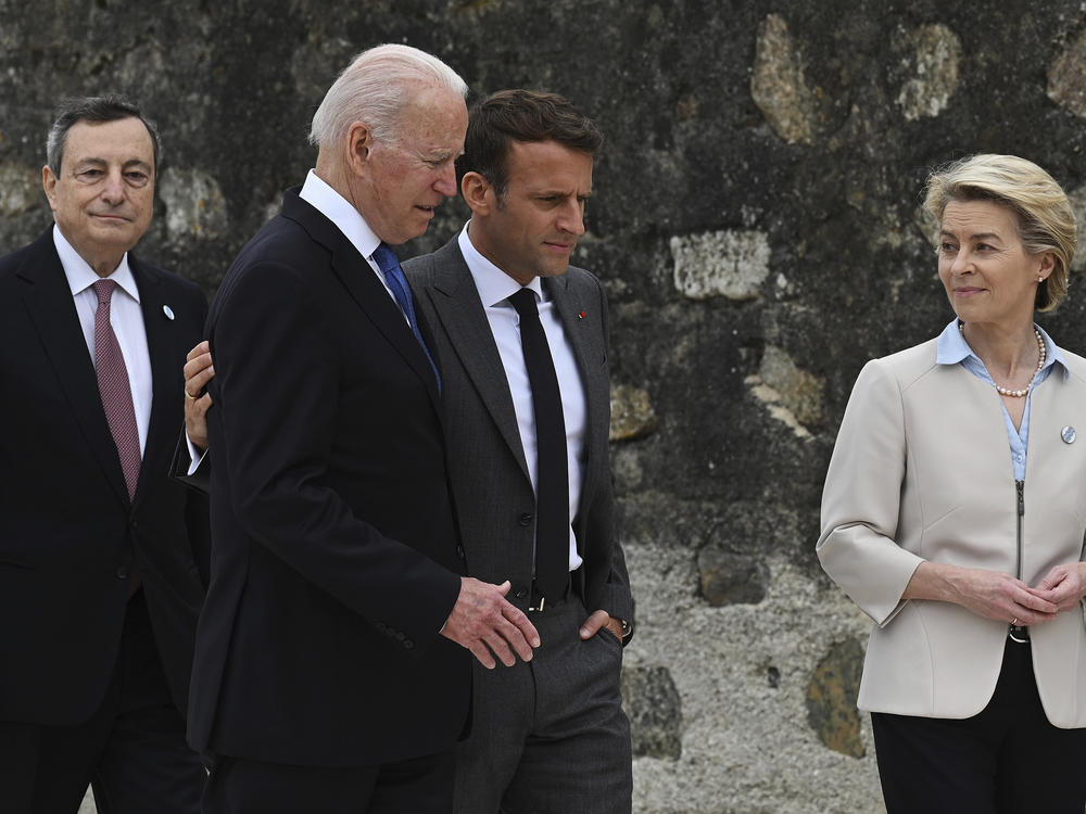 Back in June at the G-7 summit in England, French President Emmanuel Macron (center, right) and President Biden appeared to be getting along fine. They spoke Wednesday after a rift that began with a new security alliance.