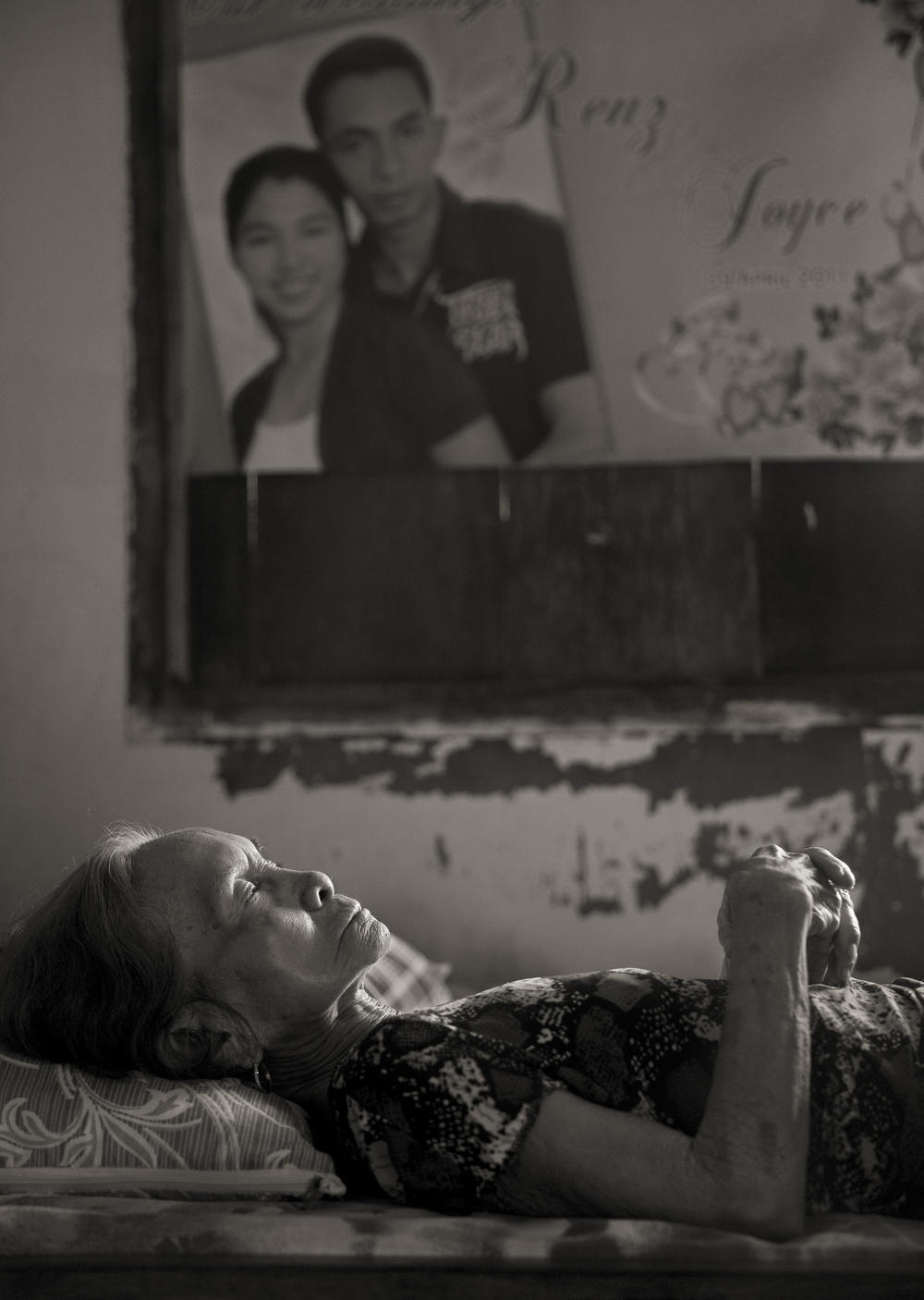 Januaria Galang Garcia takes a midday nap in the village of Mapaniqui in Pampanga, Philippines, on May 19, 2019. Garcia, who was one of the women subjected to sexual slavery during World War II, died on Sept. 3, 2021. She was 9 years old when the Japanese attacked their village, a suspected guerrilla holdout.