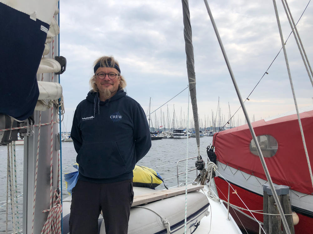 Steffen Meisner is pictured atop his sailboat in his hometown of Stralsund, home to Angela Merkel's constituency as member of parliament. Meisner says he's never voted for Merkel's party, but that he has always supported Merkel as Germany's chancellor.
