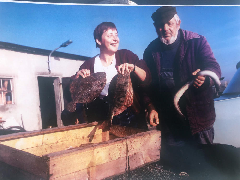 A picture that Hans-Joachim Bull has showing Merkel with his father in 1990.
