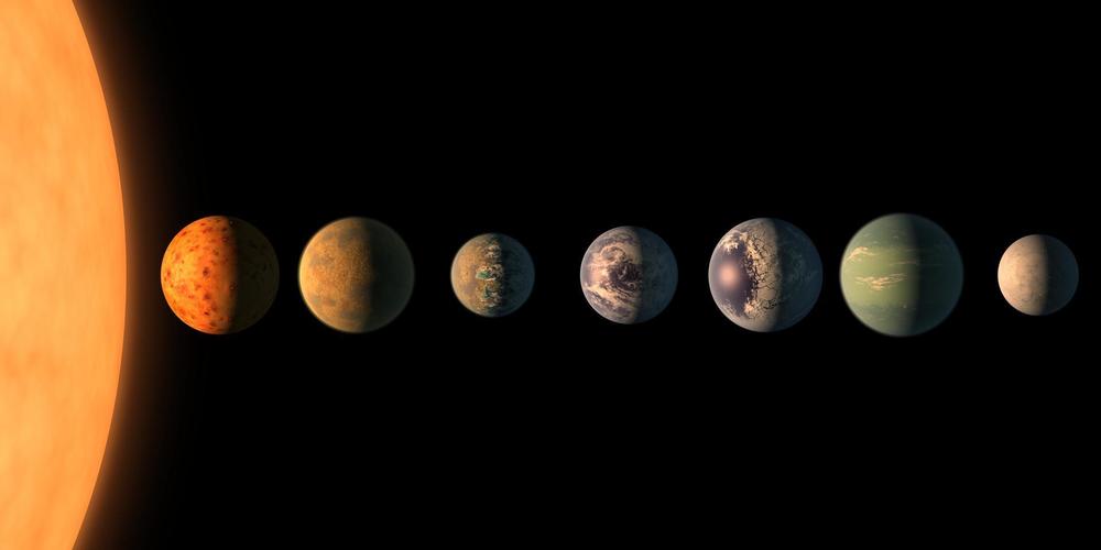 This artist's impression shows the TRAPPIST-1 star with its seven Earth-sized planets. The new telescope will be able to probe their atmospheres, if they have air.