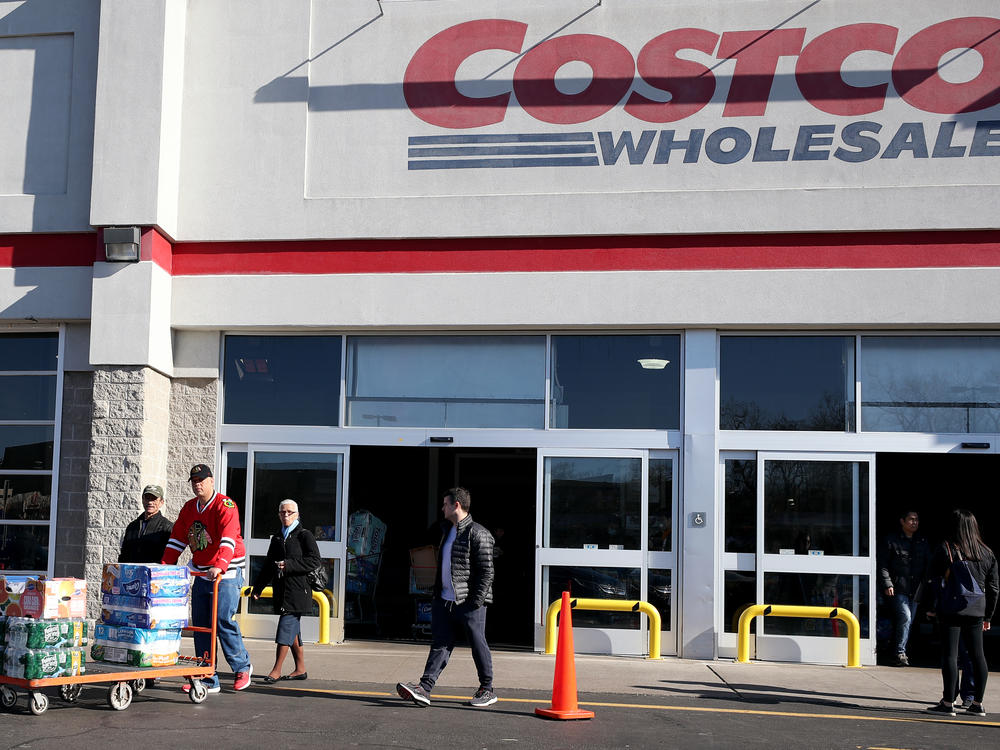 Shoppers line up to buy supplies at Costco Wholesale in New Jersey last year as fears over COVID-19 grew around the world. The company recently reintroduced limits on toilet paper, cleaning supplies and other products as it copes with supply chain challenges.