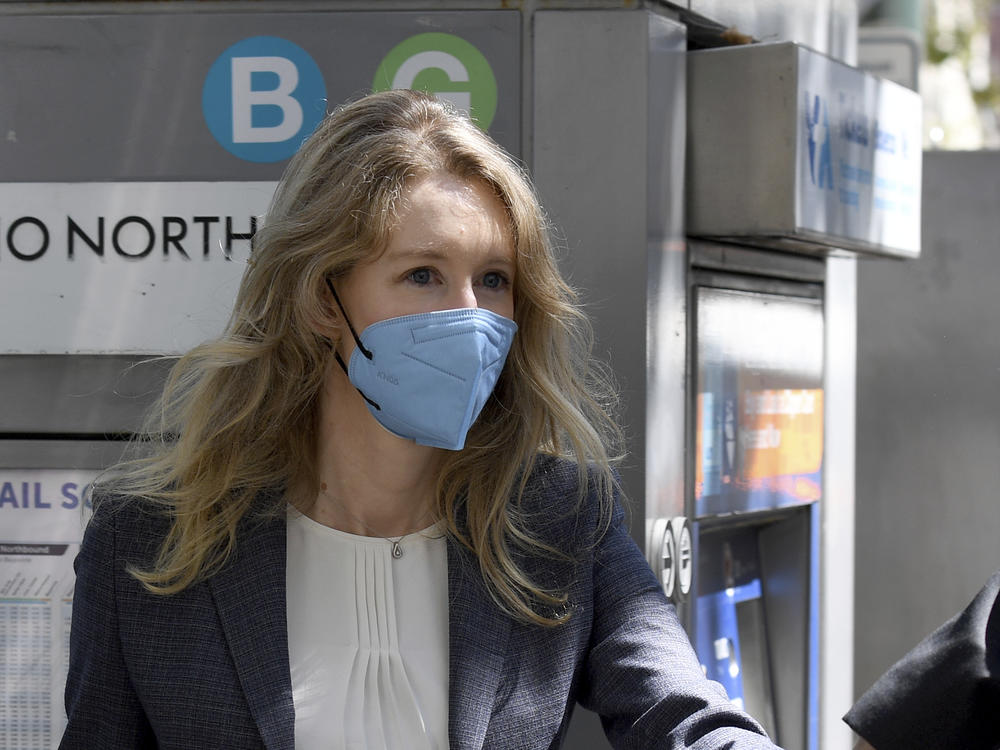 Elizabeth Holmes leaves the federal courthouse in San Jose, Calif., on Sept. 8.
