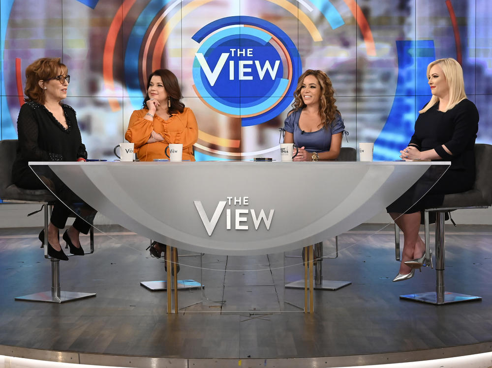 Ana Navarro (center left) and Sunny Hostin (center right) appear on <em>The View</em> on Aug. 2, 2019. The two were pulled live from the TV show on Friday, just before Vice President Harris was scheduled to join them onstage for an interview.