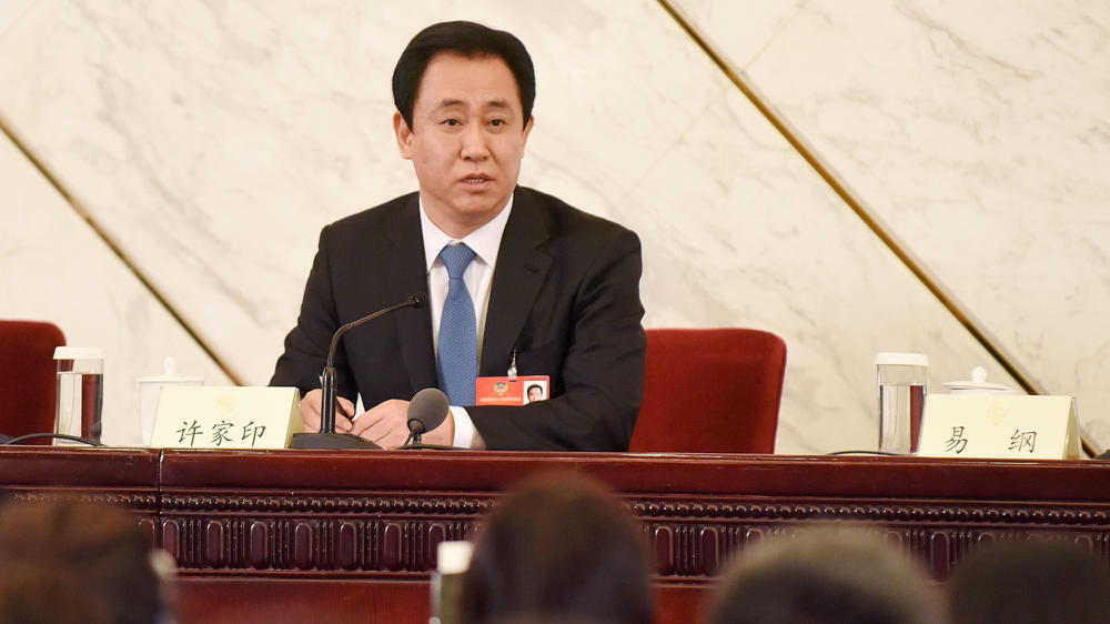 Xu Jiayin, Evergrande's politically well-connected founder, addresses a March 2016 news conference on the sidelines of the fourth session of the 12th National People's Congress in Beijing.