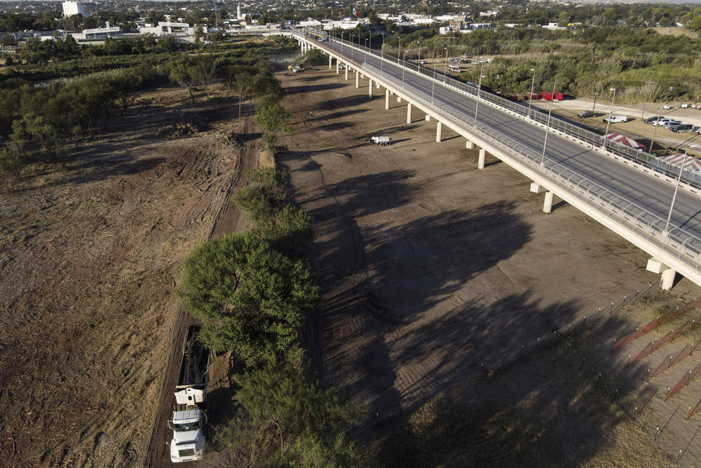 An area where migrants, many from Haiti, were encamped is seen after crews cleared the zone along the Del Rio International Bridge on Saturday in Del Rio, Texas.