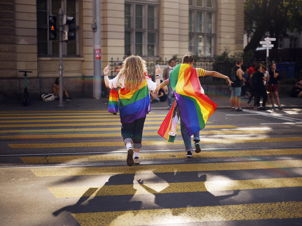 In this Saturday, Sept. 4, 2021 file photo, people take part in the Zurich Pride parade in Switzerland. Swiss voters will wrap up a referendum on Sept. 26, 2021, to decide whether to allow same-sex marriage.