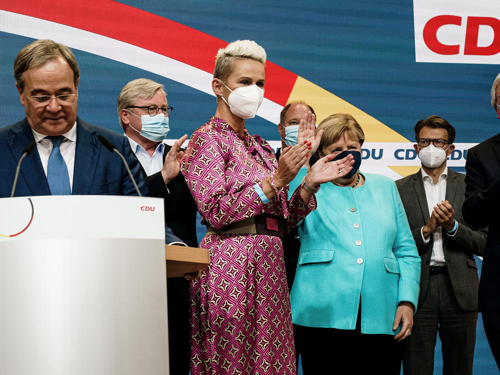 German Chancellor Angela Merkel receives applause during the Christian Democratic Union (CDU) election event on Sunday in Berlin. Voters have gone to the polls nationwide in elections that herald the end of Merkel's 16-year chancellorship.