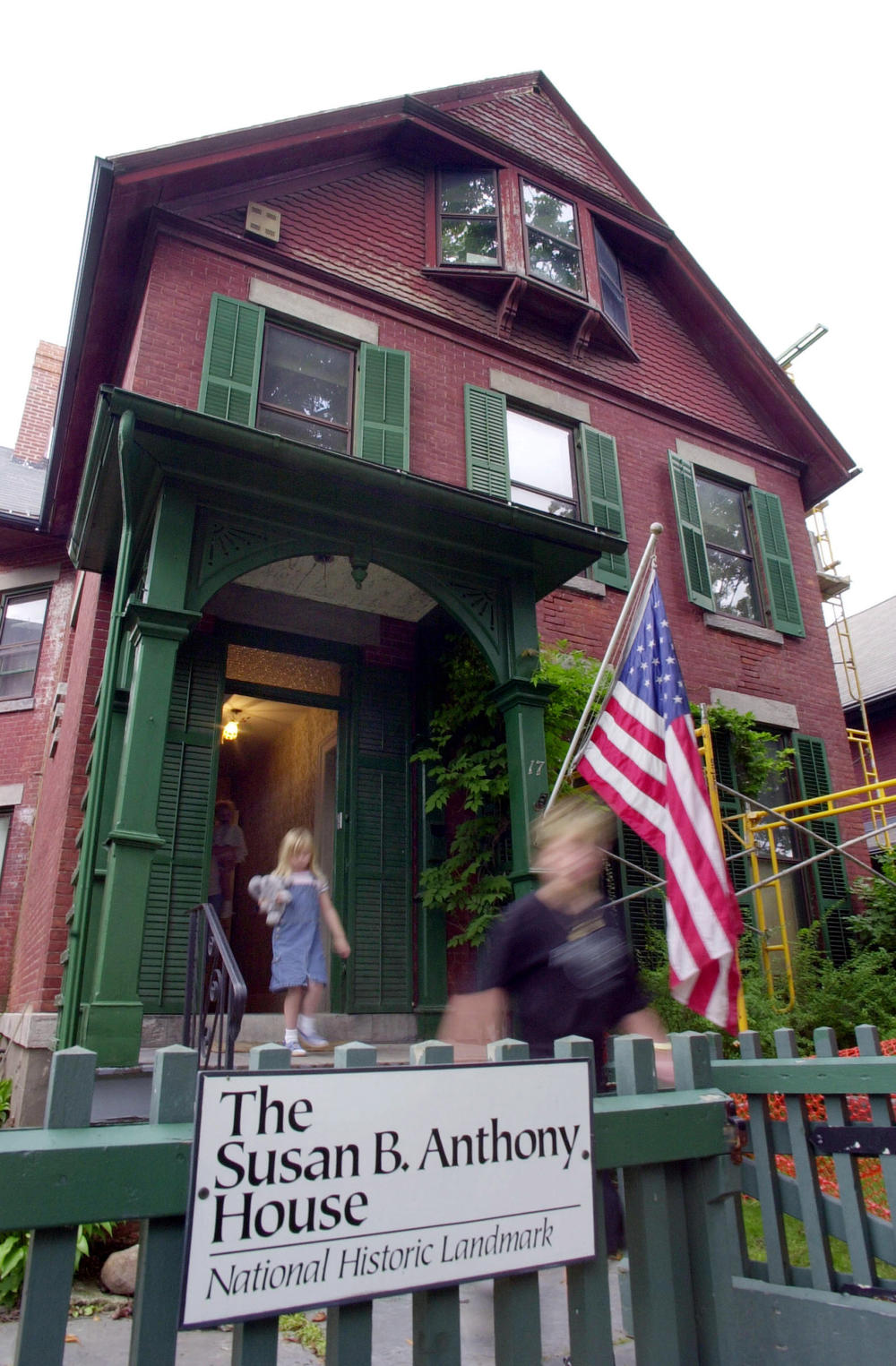 In this July 28, 2004, file photo, tourists exit the Susan B. Anthony House after taking a tour of the house in Rochester, N.Y. Fire officials in Rochester were investigating a fire that damaged the house early Sunday, Sept. 26, 2021.