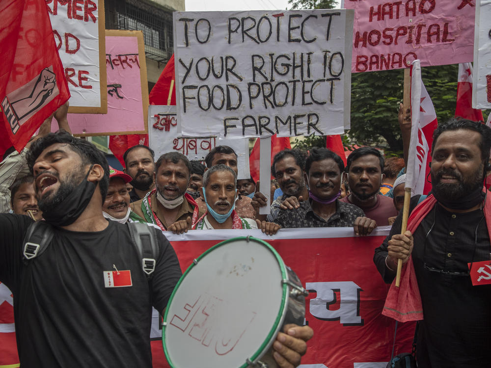 Members of Communist Party of India shout slogans during a protest against farm laws in Mumbai, India Monday, Sept. 27, 2021. The farmers called for a nation-wide strike Monday to mark one year since the legislation was passed, marking a return to protests that began over a year ago.