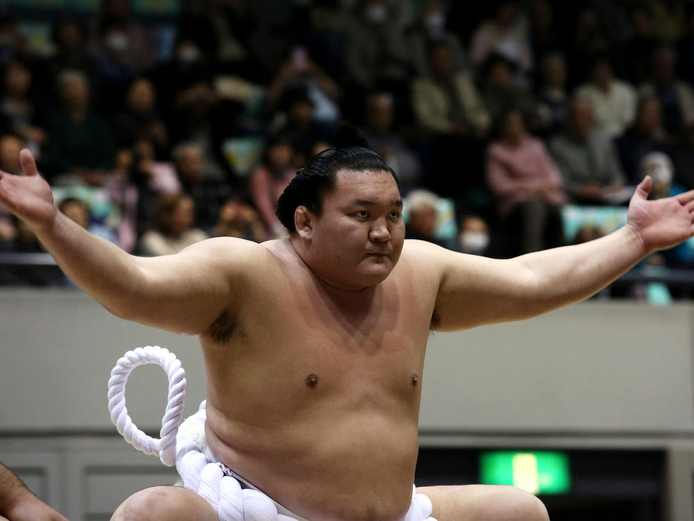 Sumo Grand Champion Hakuho performs Dohyo-iri, the ring-entering ceremony, during the Grand Sumo Tournament at the Himeji Chuo Gymnasium, in March 2015, in Himeji, Japan.