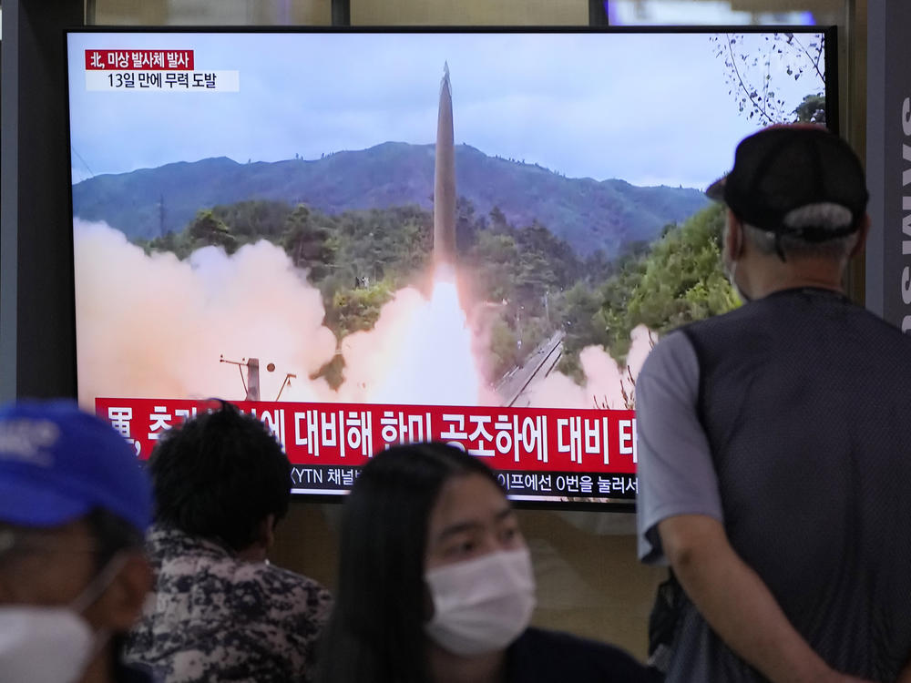 People watch a TV showing a file image of North Korea's missile launch during a news program at the Seoul Railway Station in Seoul, South Korea, Tuesday, Sept. 28. North Korea on Tuesday fired a suspected ballistic missile into the sea, Seoul and Tokyo officials said, the latest in a series of weapons tests by Pyongyang.