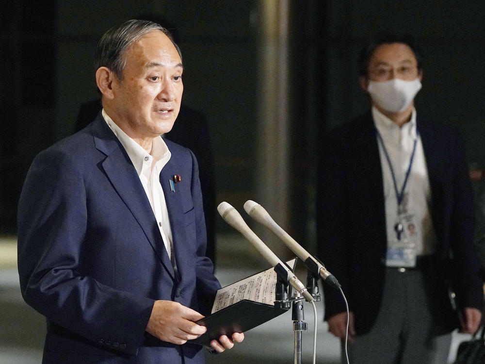 Japanese Prime Minister Yoshihide Suga speaks to reporters about lifting of a state of emergency at his official residence in Tokyo Monday, Sept. 27. Suga announced Tuesday a lifting of the ongoing coronavirus state of emergency and less-stringent measures in all 27 prefectures including Tokyo when they expire at the end of September.