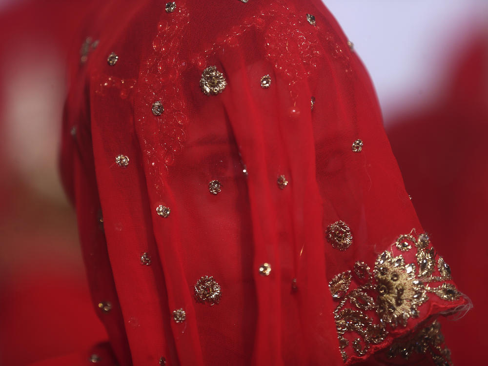 A bride in India. There's a movement to get the government to raise the legal age of marriage for women from 18 to 21.