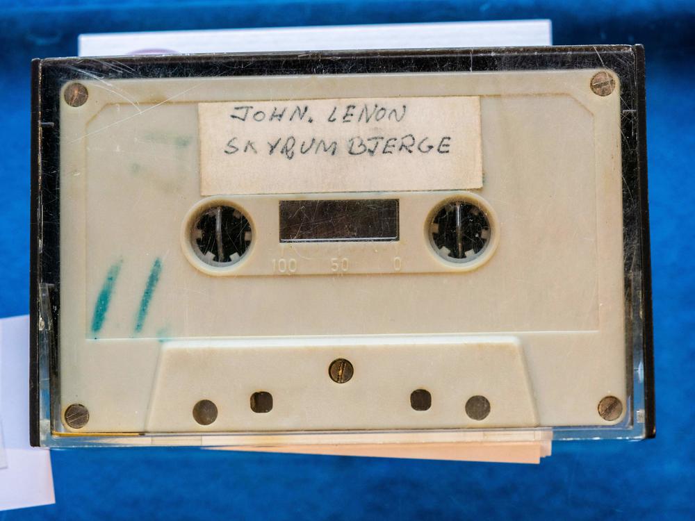 The cassette contains a 33-minute recording of Lennon (and sometimes Ono) speaking to young journalists and singing two songs.