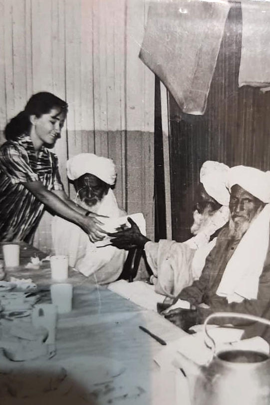 Mukhru Khodzhayeva worked as an interpreter during the Soviet war in Afghanistan. Here she meets with Afghan village elders in 1989. 