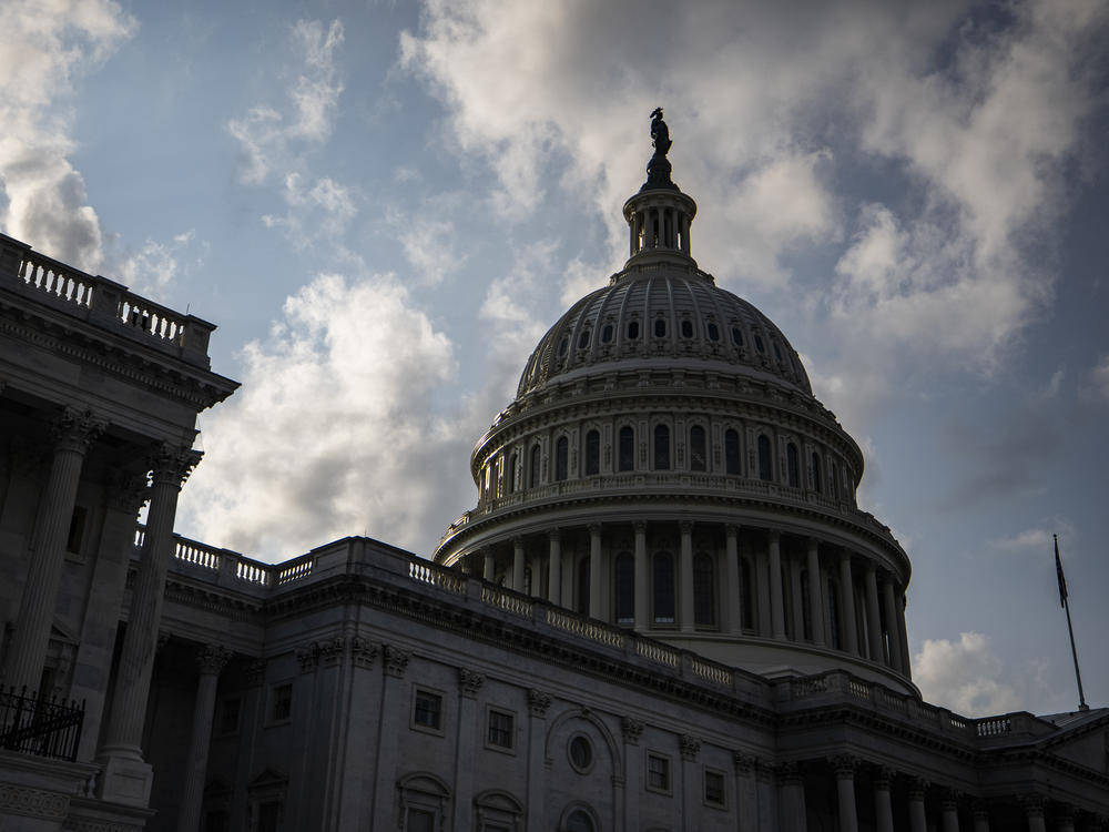 Congress is moving to avert one crisis while putting off another. Both the House and Senate approved legislation Thursday that would fund the federal government through Dec. 3.