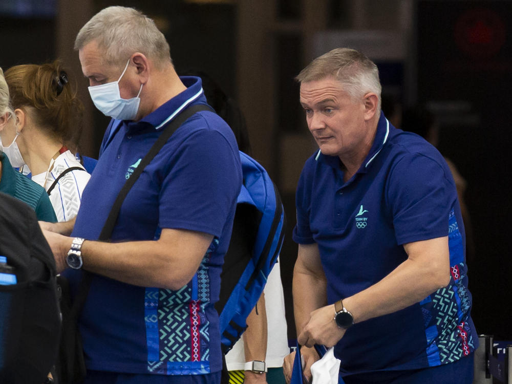 Belarus track coaches Artur Shimak (left) and Yury Maisevich are now under investigation, Olympics officials announced on Thursday. The pair are seen here last month at a checkpoint at a Tokyo airport.