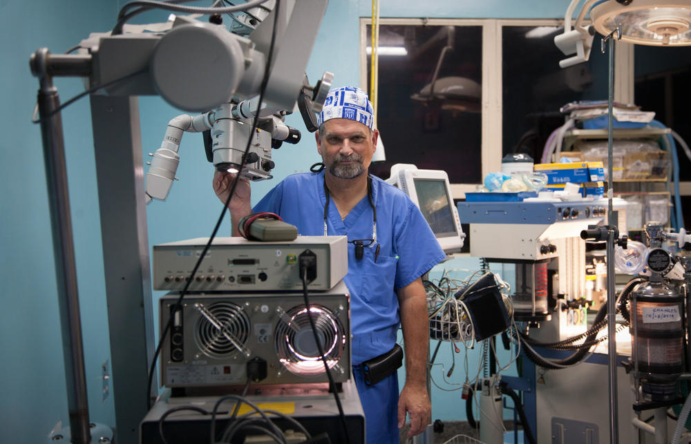 Dr. Michael Haglund stands in an operating theater at Mulago National Referral Hospital in Kampala, Uganda, in 2014. Haglund, the founder of Duke Global Neurosurgery and Neurology, had been traveling to Uganda to perform brain surgeries twice a year since 2007 – until the pandemic hit.