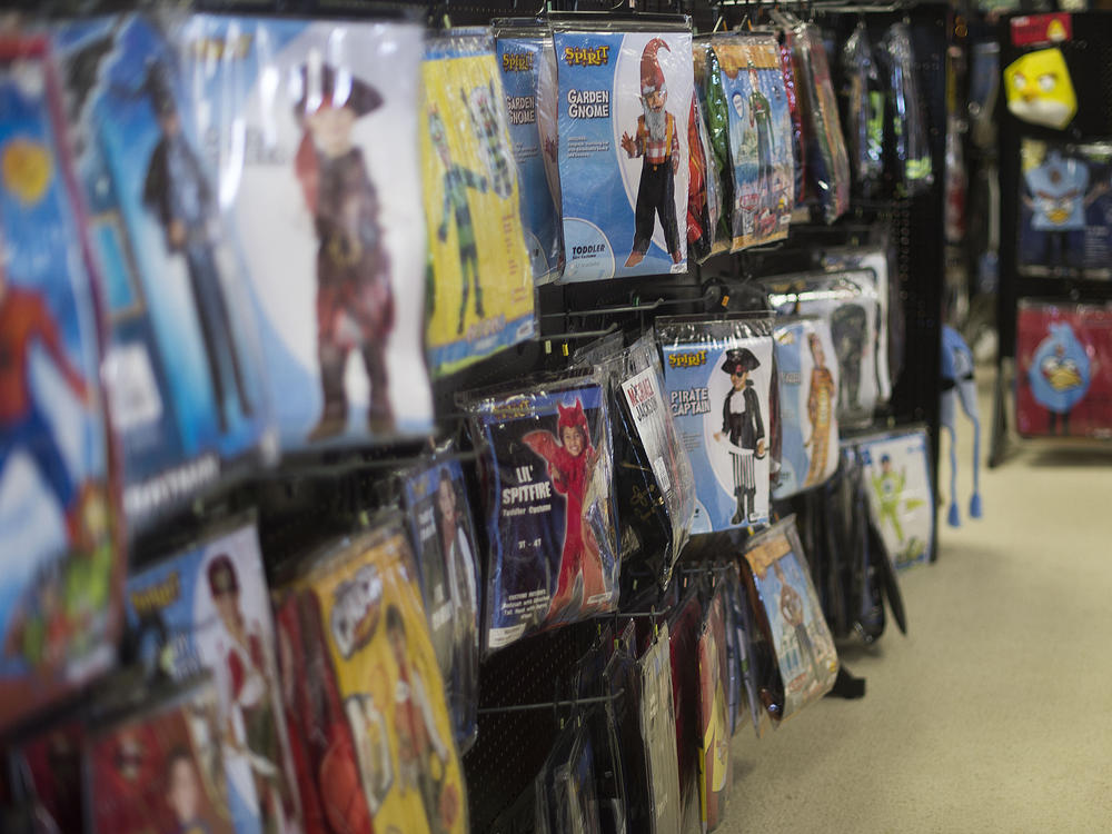 Children's Halloween costumes hang on a wall at Spirit Halloween costume store in Easton, Maryland, in October 2013. The stores offer seasonal Halloween supplies for a limited time during the season.