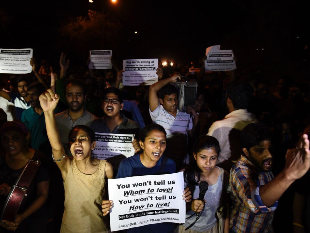 Members of Jawaharlal Nehru University Students' Union march against the screening of the film <em>In the Name of Love - Melancholy of God's Own Country</em>, in New Delhi, on April 28, 2018. The protesters accused the film of spreading hate through the conspiracy theory known as 