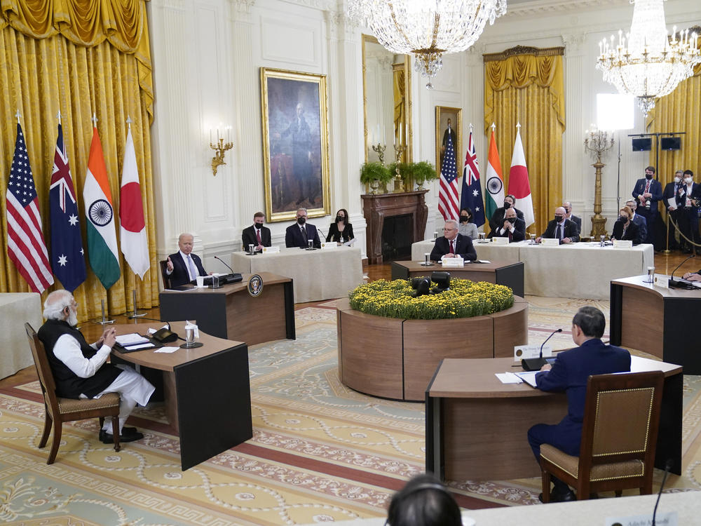 President Biden speaks during a Sept. 24 summit at the White House that included (clockwise from left) Indian Prime Minister Narendra Modi, Biden, Australian Prime Minister Scott Morrison, U.S. Secretary of State Antony Blinken and Yoshihide Suga, Japan's prime minister at the time.