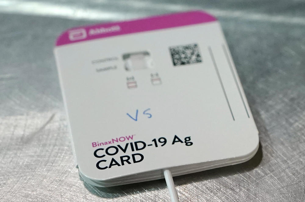 The Biden administration has announced a new investment in at-home COVID tests. Here, an Abbott BinaxNow test.