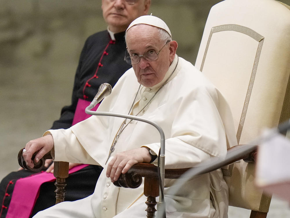 Pope Francis listens to speeches during his weekly general audience in the Pope Paul VI hall at the Vatican, Wednesday, Oct. 6, 2021.
