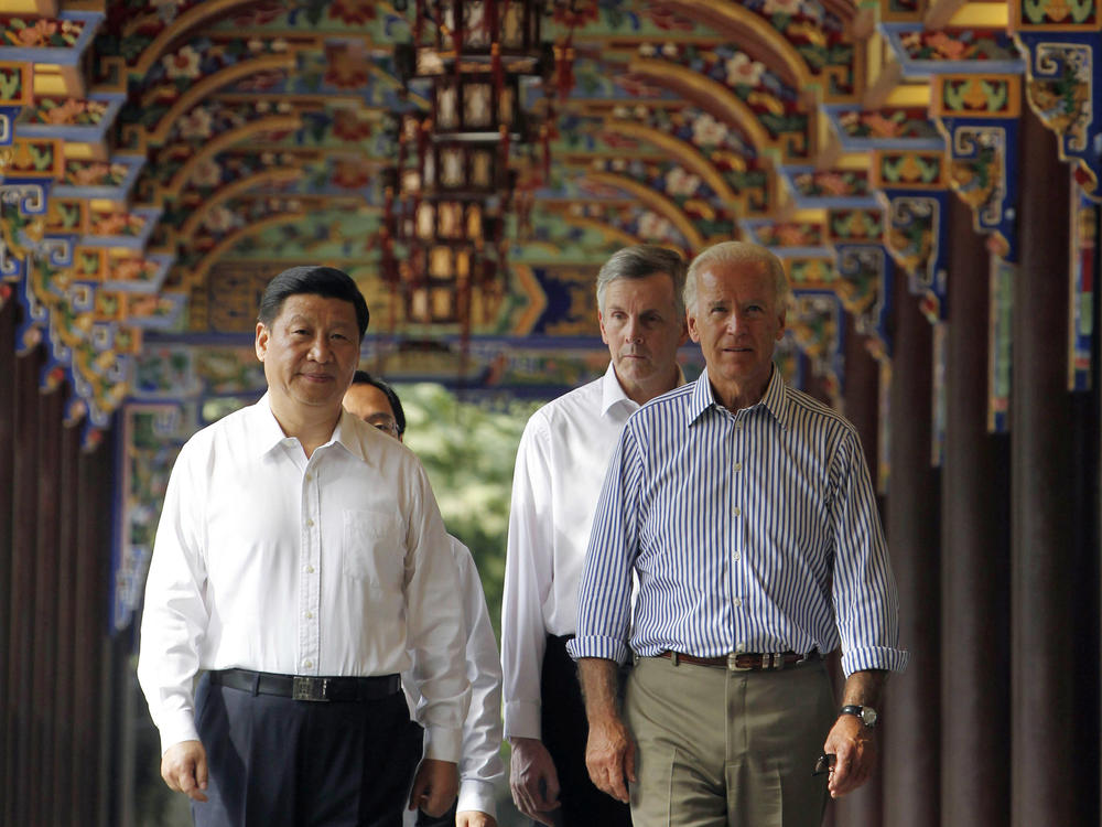In this 2011 photo, then-U.S. Vice President Joe Biden walks with then-Chinese Vice President Xi Jinping in southwestern China. Both are now presidents of their countries at a time when U.S.-China relations have been growing increasingly tense.
