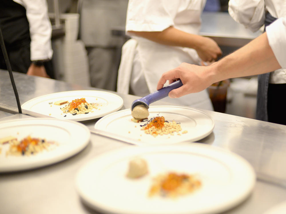 Chefs prepare food at Mexico's Dinner With Enrique Olvera And Jordi Roca during Food Network & Cooking Channel New York City Wine & Food Festival presented By FOOD & WINE at Cosme NYC on October 15, 2015 in New York City. Cosme is one of six U.S. honorees on the 2021 list of the world's 50 best restaurants.