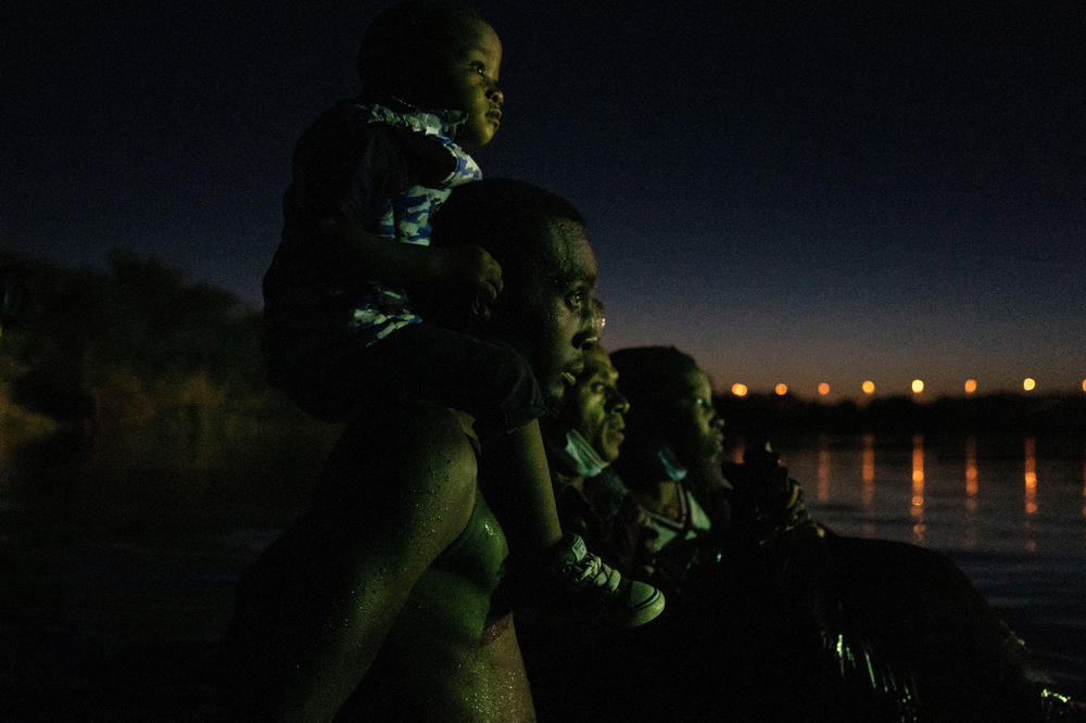 Haitian migrants cross the Río Grande into the U.S. from Ciudad Acuña, México on Sept. 22, 2021.