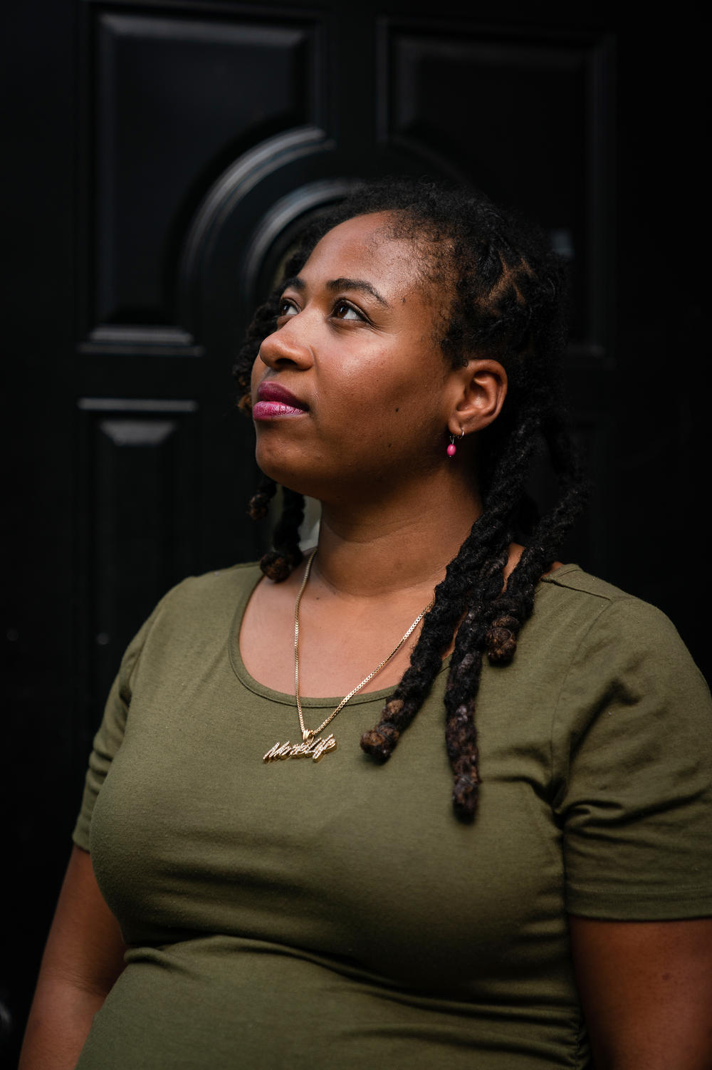 Akira Johnson outside her apartment last month.