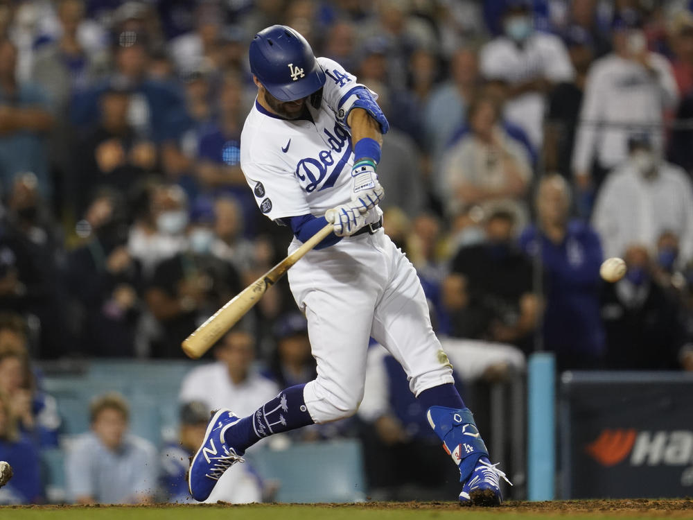 Los Angeles Dodgers' Chris Taylor (3) hits a home run during the ninth inning to win a National League Wild Card playoff baseball game 3-1 over the St. Louis Cardinals Wednesday, Oct. 6, 2021, in Los Angeles. Cody Bellinger also scored.