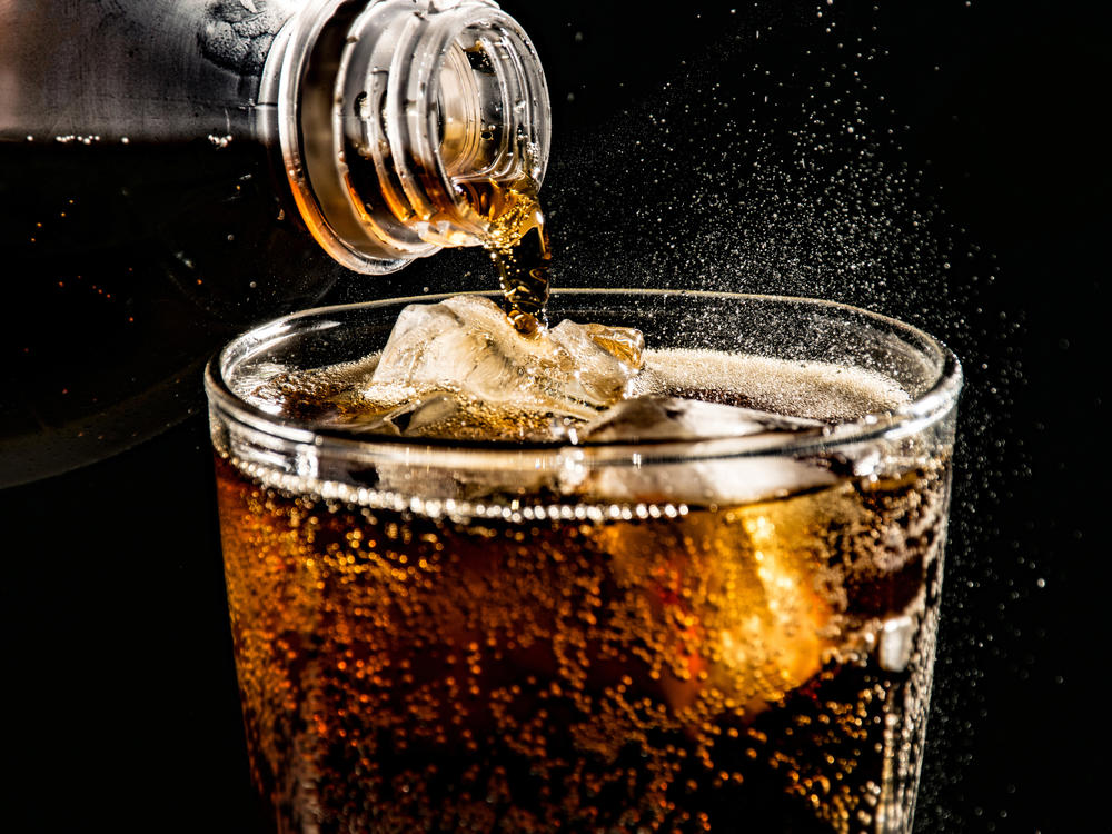 Drinking artificially sweetened diet sodas may lead to increase in appetite and weight gain, research finds.