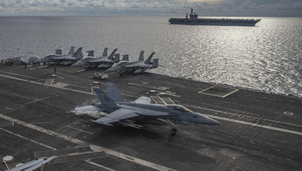 A U.S. F/A-18E Super Hornet lands on the flight deck of the USS Ronald Reagan in the South China Sea in July 2020. U.S. officials now routinely describe China as the leading national security threat as relations have worsened in recent years.