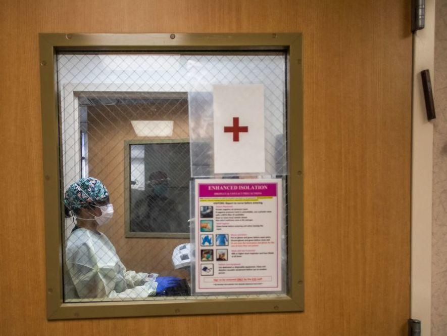 Registered nurse Christie Lindog works at the cardiovascular intensive care unit at Providence Cedars-Sinai Tarzana Medical Center in Tarzana, Calif., on Sept. 2.