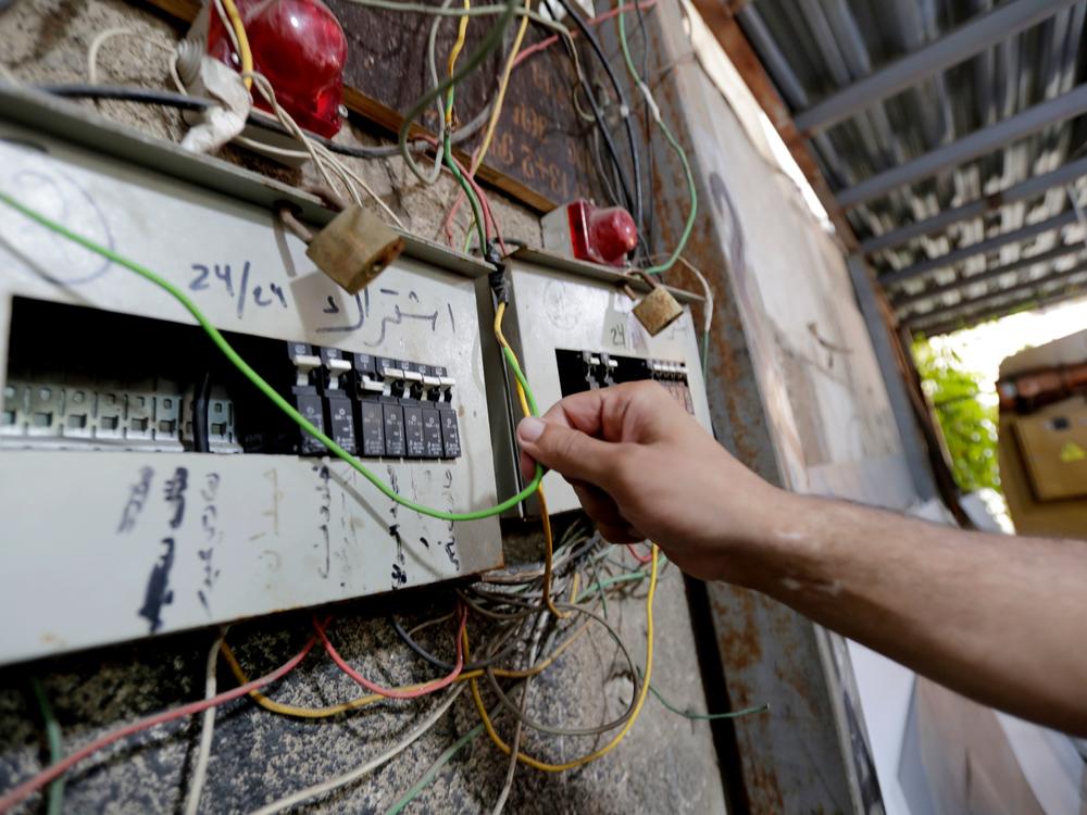 A picture taken on November 4, 2019, shows a circuit breaker of an electric generator supplying homes with electricity in the Lebanese capital Beirut's southern suburbs.