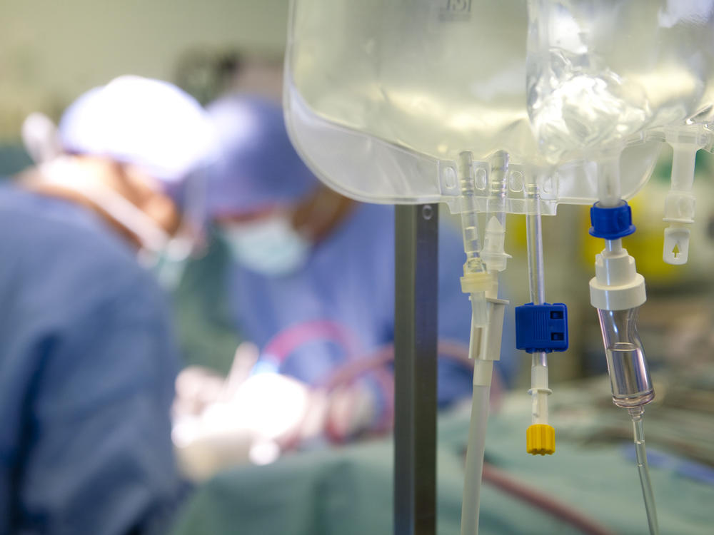 Surgeons remove the liver and kidneys of a deceased donor, for later transplantation.
