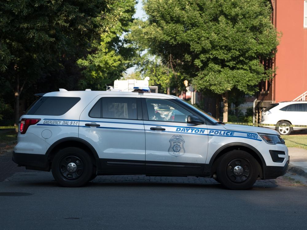 A Dayton Police vehicle is viewed after an active shooter opened fire in the Oregon district in Dayton, Ohio on August 4, 2019.