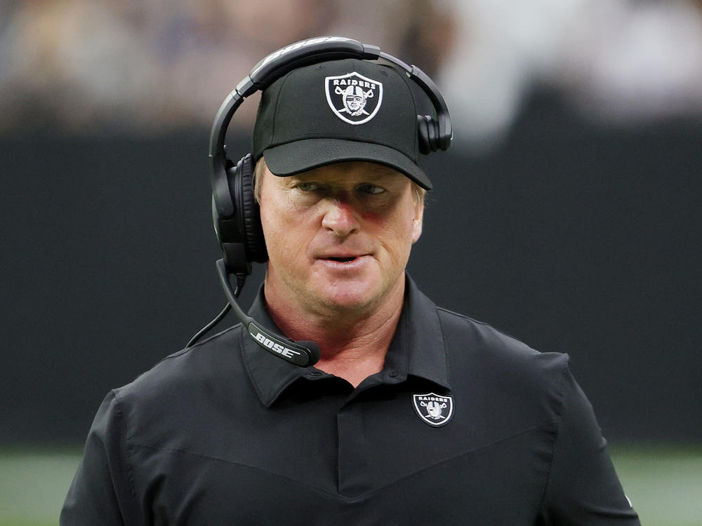 Jon Gruden resigned as coach of the Las Vegas Raiders on Monday night following reports he had sent derogatory and offensive emails. Gruden is seen here on the sidelines against the Chicago Bears on Sunday in Las Vegas, Nev.