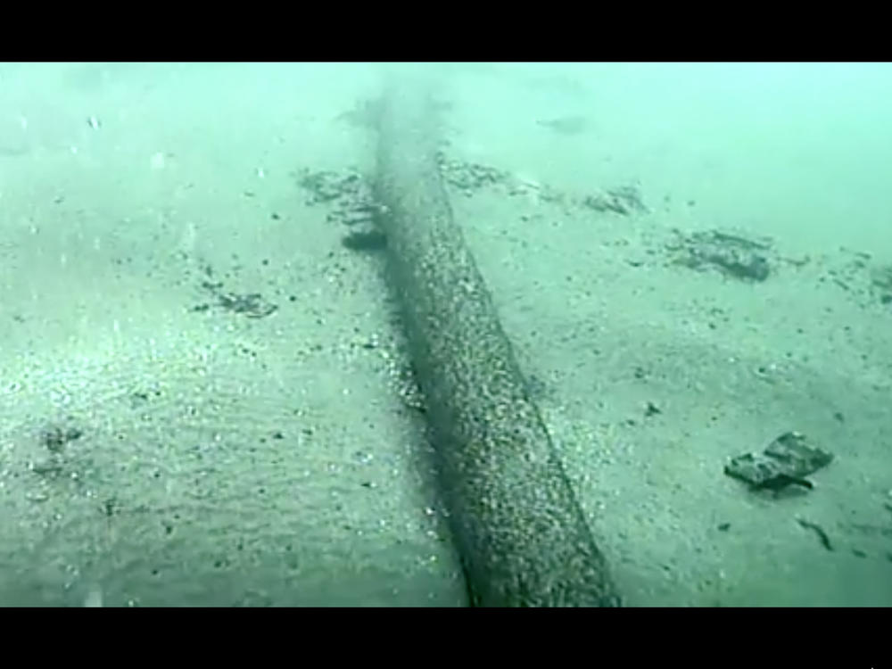 This still image from video taken Oct. 4 shows an underwater pipeline that spilled tens of thousands of gallons of oil off the coast of Orange County, Calif. Video of the ruptured pipeline shows a thin crack along the top of the pipe that could indicate a slow leak that initially was difficult to detect, experts said.