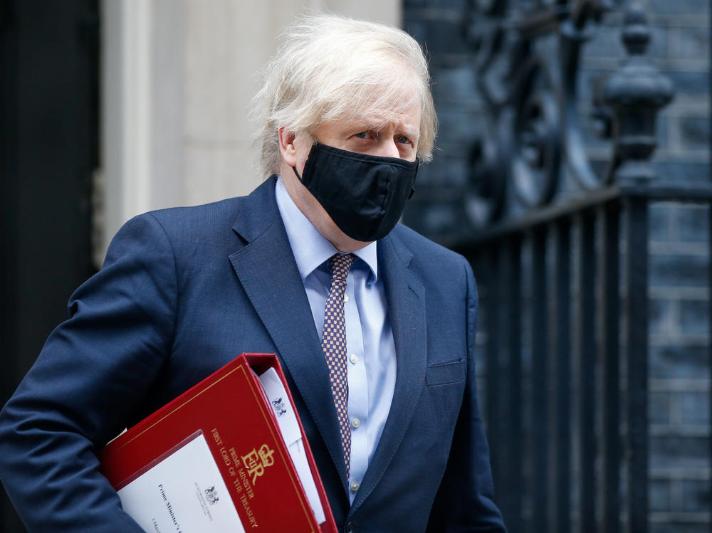 A mask-clad U.K. Prime Minister Boris Johnson departs from No. 10 Downing St. in London in March.