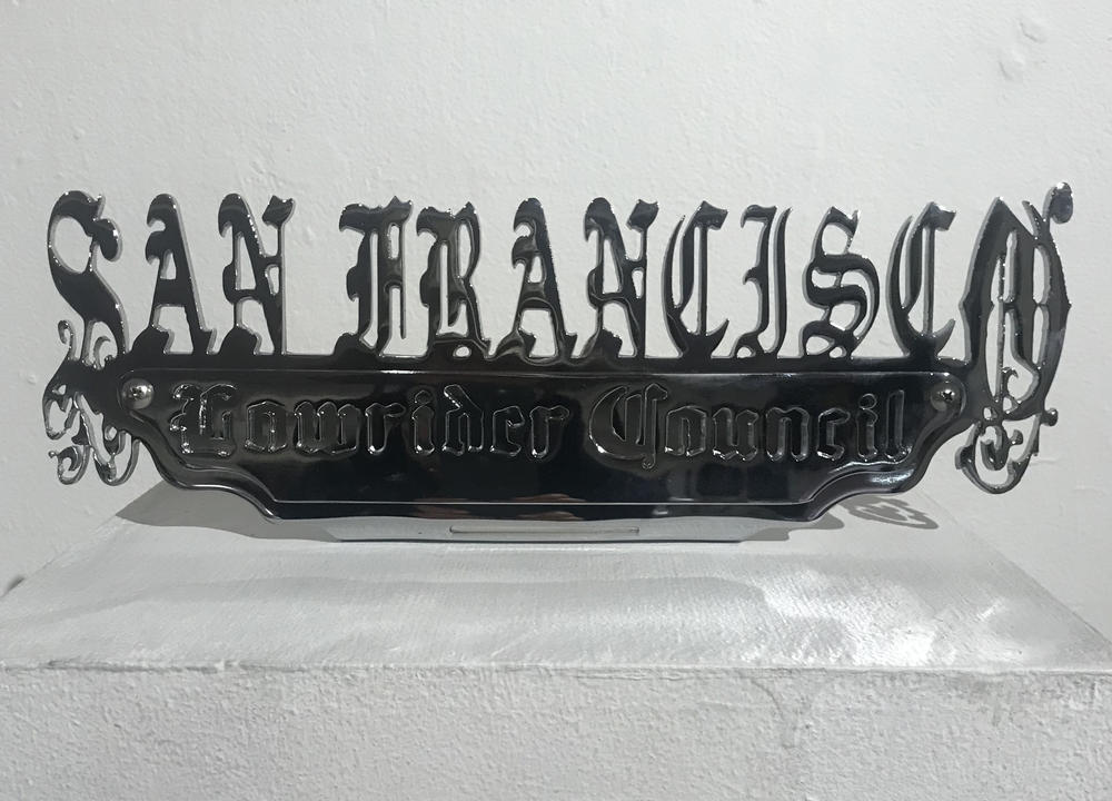 The San Francisco Lowrider Council plaque on display at the Mission Cultural Center for Latino Arts.