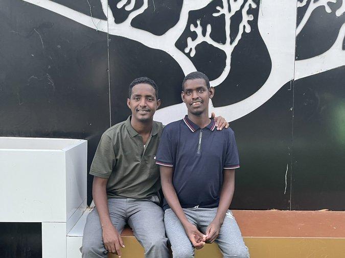Omar Mohamed, left, and his brother, Hassan. In the graphic memoir he coauthored, <em>When Stars Are Scattered, </em>Mohamed shares what their life was like in the refugee camps in Kenya — and their journey to resettlement in the U.S.