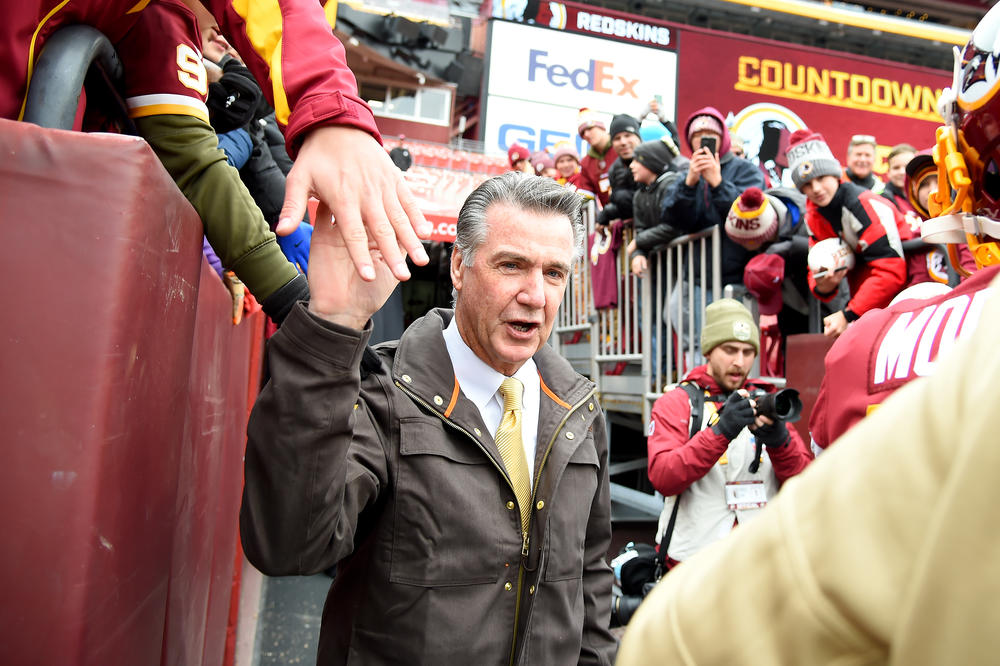 Bruce Allen, then president of the Washington Football Team, walks onto the field before a game against the New York Jets at FedExField in Maryland in 2019.