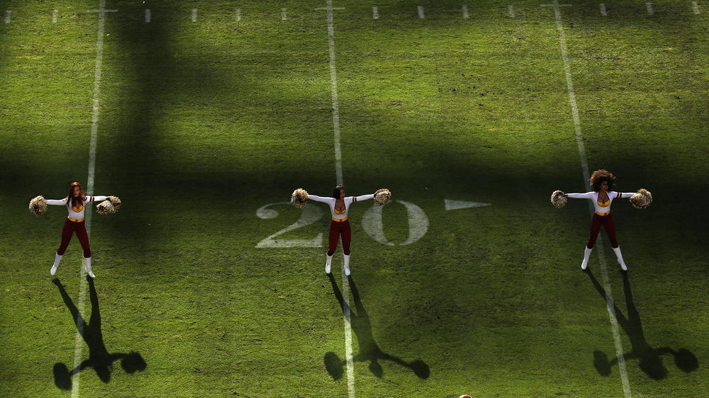 Washington Football Team cheerleaders perform as their team plays against the Philadelphia Eagles at FedExField in Maryland on Dec. 15, 2019.
