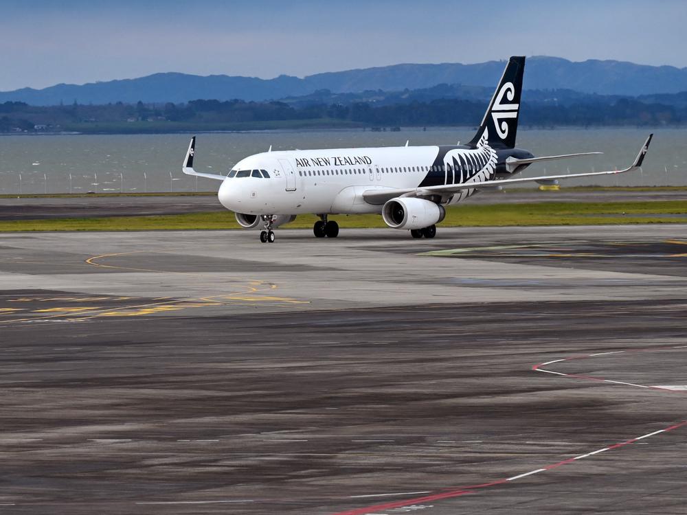 An Air New Zealand plane arrives at Auckland Airport on Aug. 9. Some Aucklanders will be able to get their first dose of a COVID-19 vaccine aboard a 787 on Saturday.