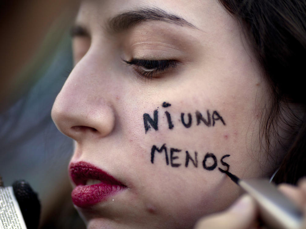 A protester has the Spanish message 