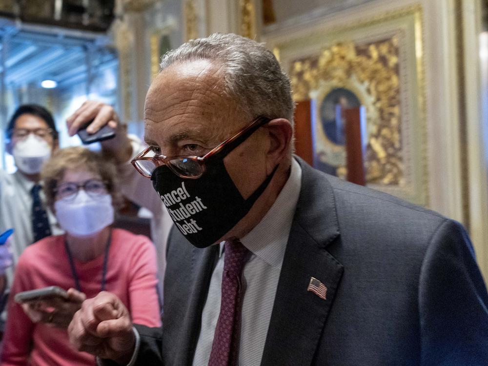 Senate Majority Leader Chuck Schumer says the chamber will vote next week on voting rights and will aim to move President Biden's spending agenda this month.